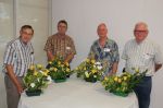 The Four Amigos with the floral designs created during a live demo with Edna Caldwell